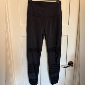 Beyond Yoga Black Performance Leggings with mesh cut outs on legs